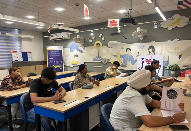 students attending an offline Pearson Test of English (PTE) class